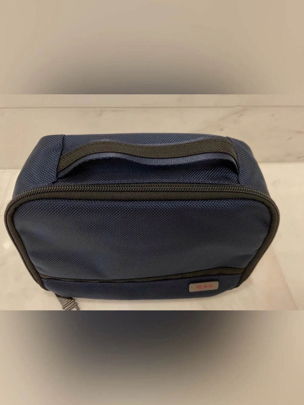 Tumi up sale